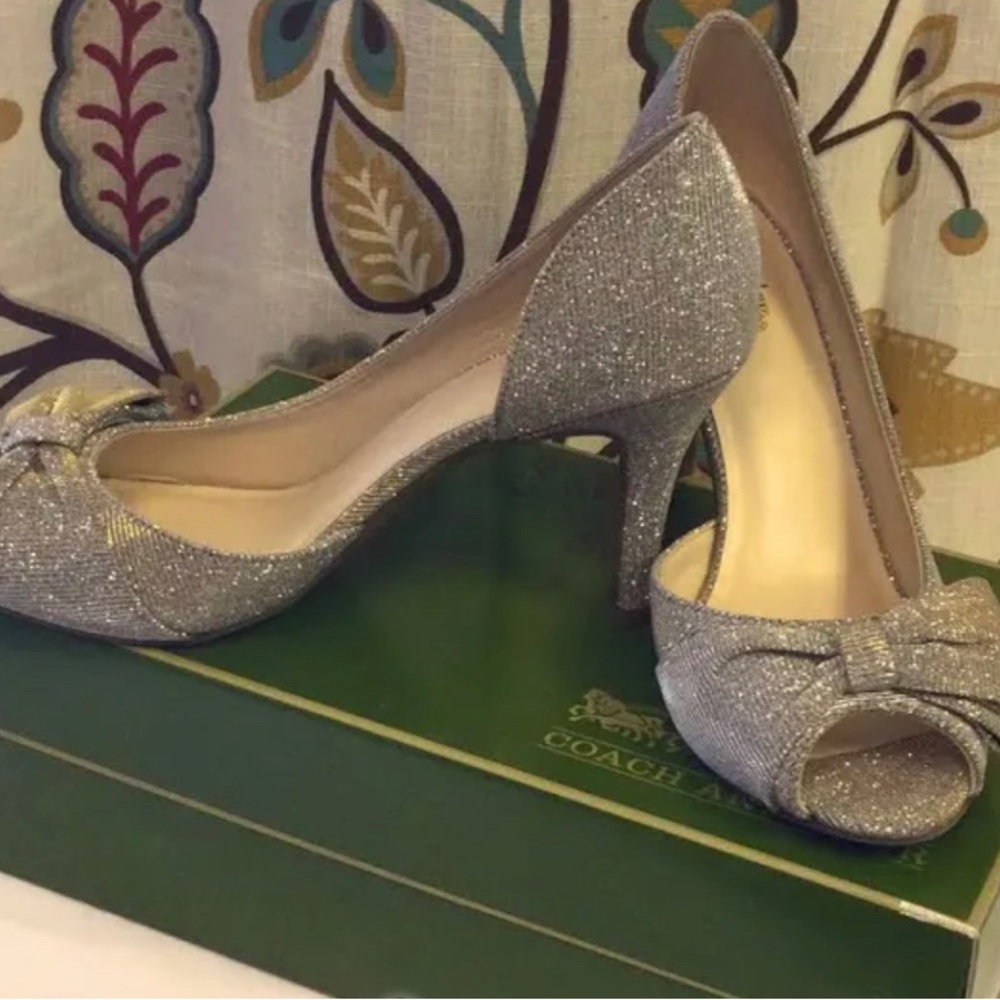 Coach and four sparkly silver heels with bow